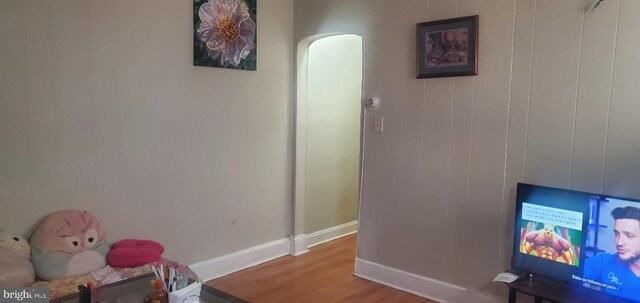 living area with wood-type flooring