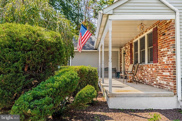 rear view of house with a yard