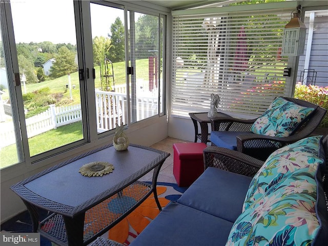 sunroom / solarium with a healthy amount of sunlight