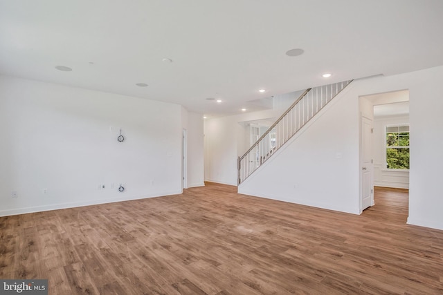 spare room with light hardwood / wood-style flooring