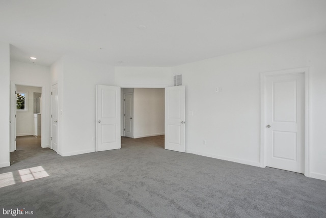 unfurnished bedroom with carpet