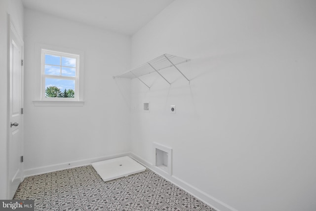 washroom with tile patterned floors, hookup for a washing machine, and hookup for an electric dryer