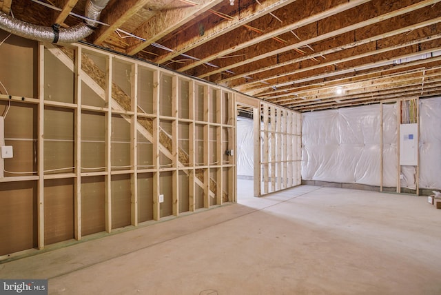 basement featuring electric panel