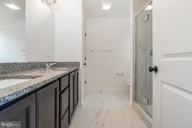 bathroom with tile patterned flooring, a shower with door, toilet, and vanity