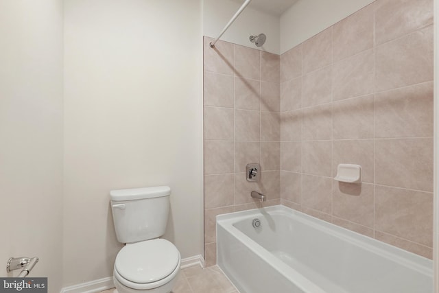 full bath featuring tile patterned flooring, baseboards, shower / bath combination, and toilet