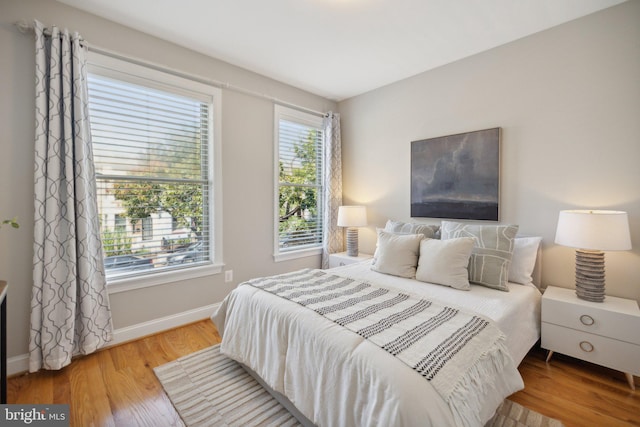 bedroom featuring hardwood / wood-style floors