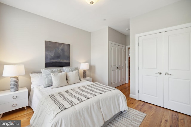 bedroom featuring light wood-type flooring