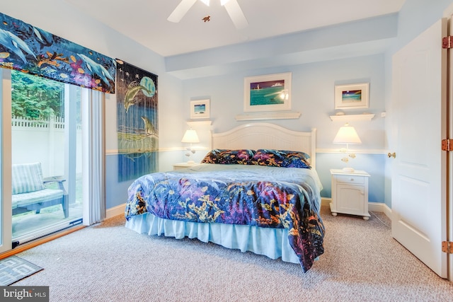 carpeted bedroom featuring access to exterior, ceiling fan, and baseboards