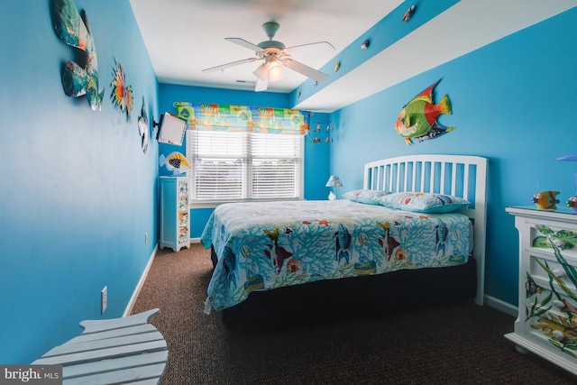 bedroom featuring carpet, a ceiling fan, and baseboards