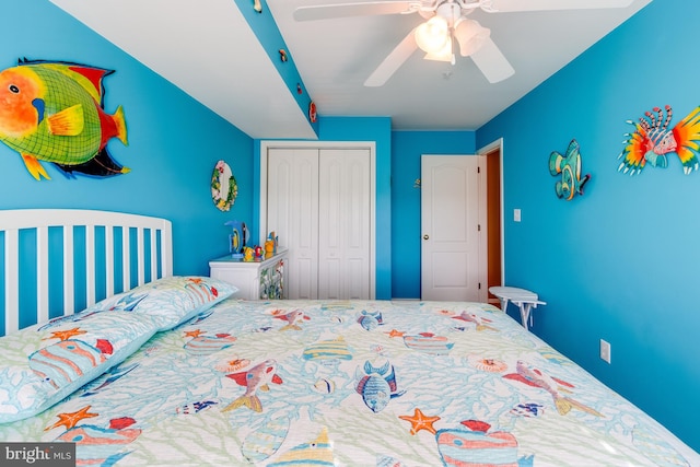 bedroom featuring a ceiling fan and a closet