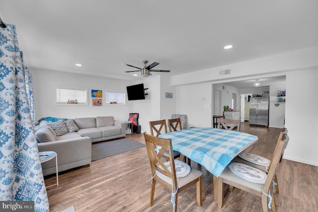 dining area featuring recessed lighting, visible vents, wood finished floors, and a ceiling fan