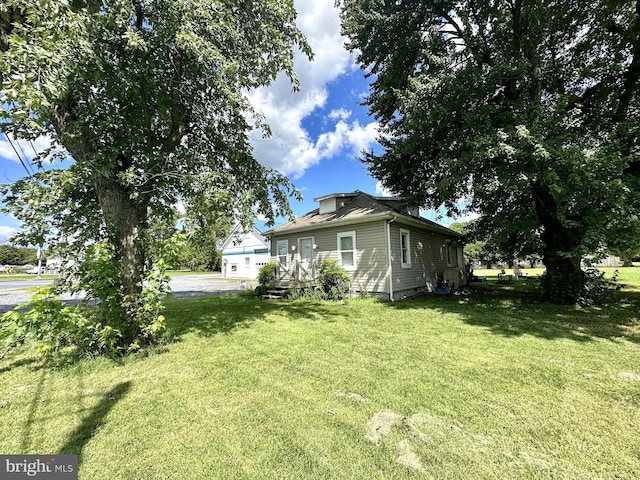 view of yard with a garage