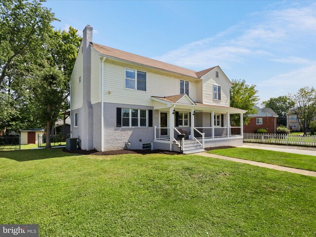 view of front facade with a porch and a front yard