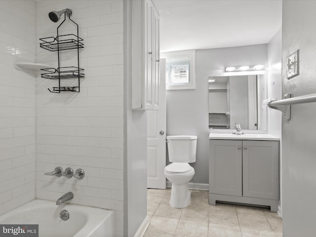 bathroom with tile patterned flooring, baseboards, toilet, shower / bathtub combination, and vanity