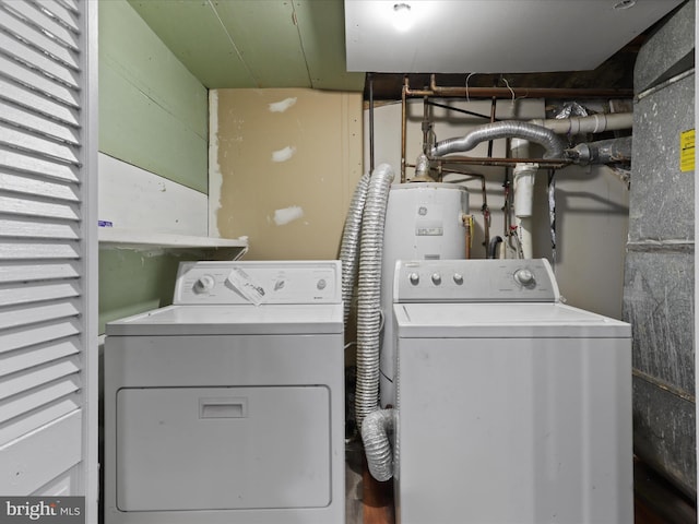 laundry area featuring independent washer and dryer and laundry area