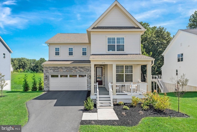 view of front of house featuring aphalt driveway, a porch, a front yard, a garage, and stone siding