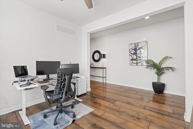 home office featuring ceiling fan and dark hardwood / wood-style flooring