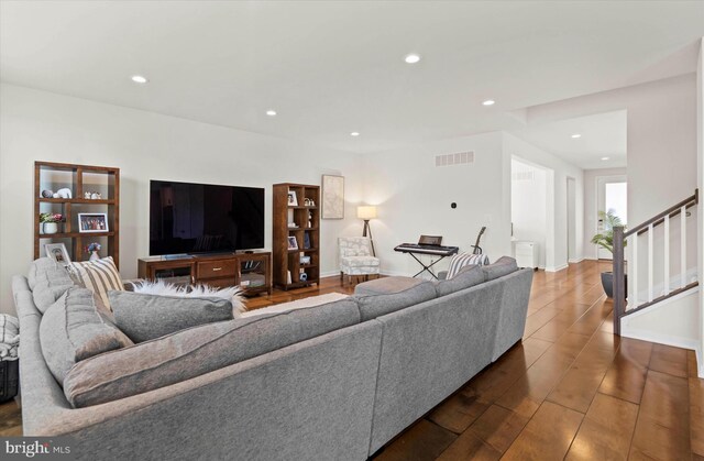 living room with dark wood-type flooring