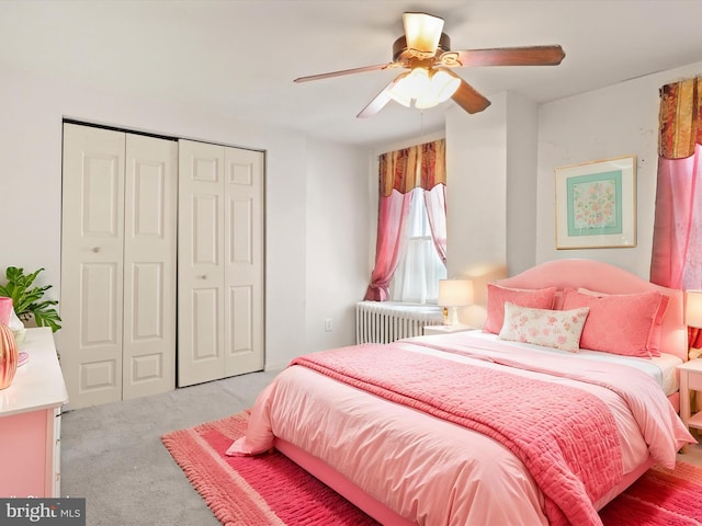 bedroom featuring light carpet, radiator heating unit, and ceiling fan