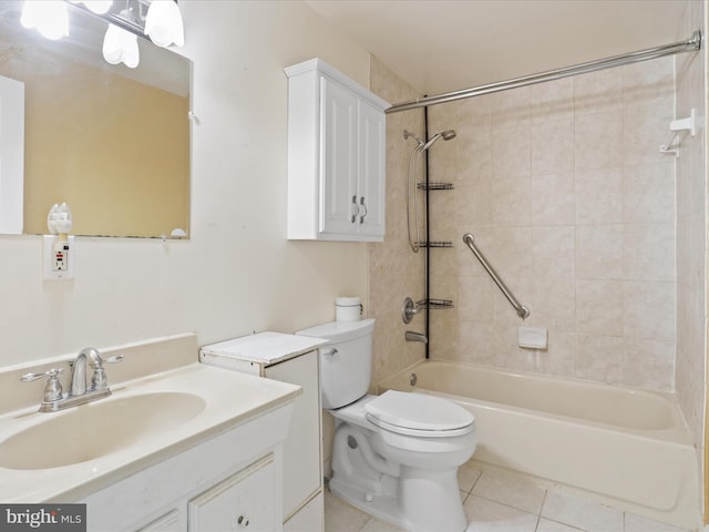 full bathroom featuring vanity, toilet, tile patterned floors, and tiled shower / bath combo