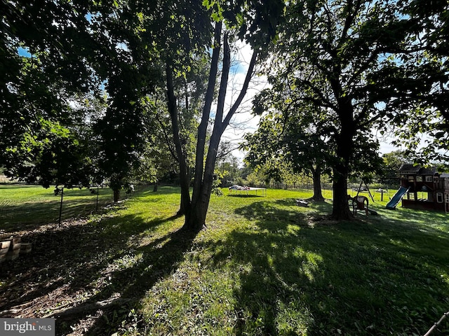 view of yard with a playground