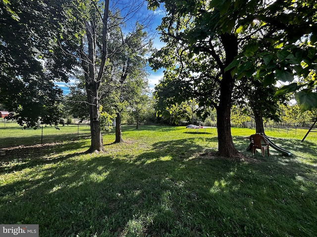 view of yard with fence