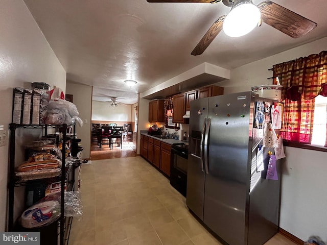 kitchen with a ceiling fan, black range with electric stovetop, under cabinet range hood, and stainless steel fridge with ice dispenser