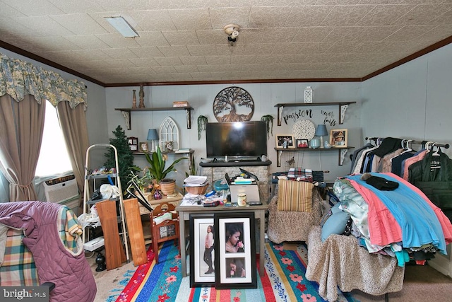 carpeted living room with cooling unit and ornamental molding