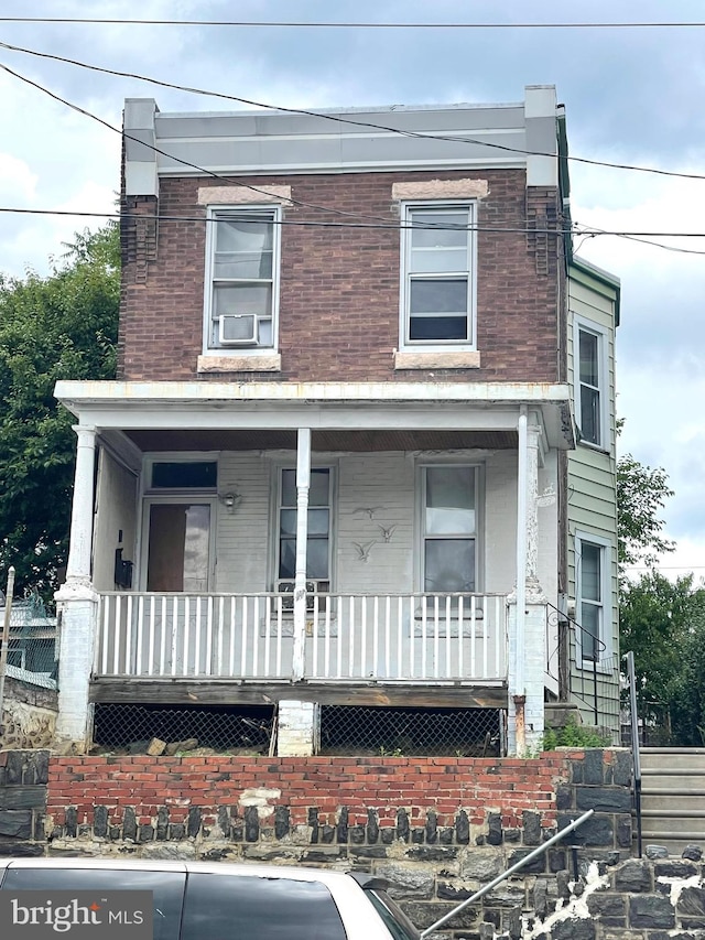 view of front of home featuring covered porch