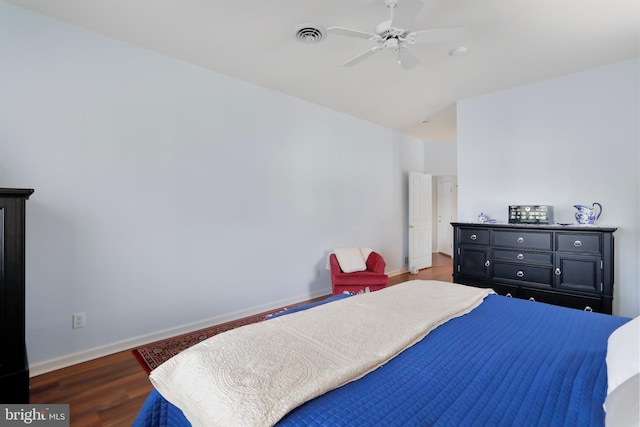 bedroom featuring ceiling fan and hardwood / wood-style flooring