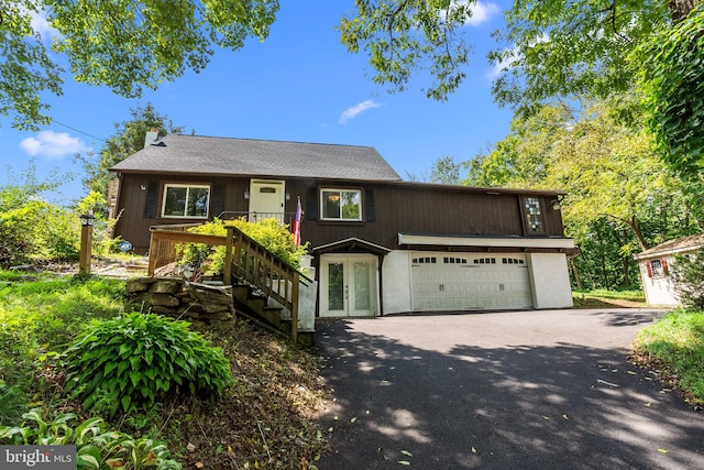 view of front of property featuring a garage