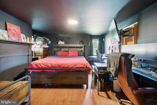 bedroom featuring light wood-type flooring