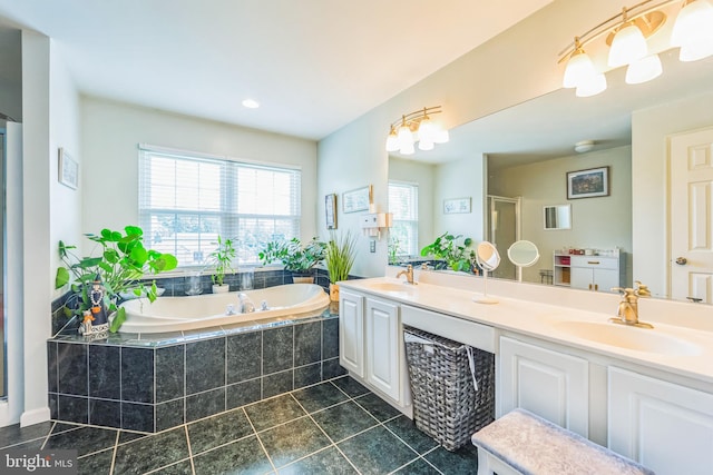 bathroom featuring vanity, plus walk in shower, and tile patterned flooring