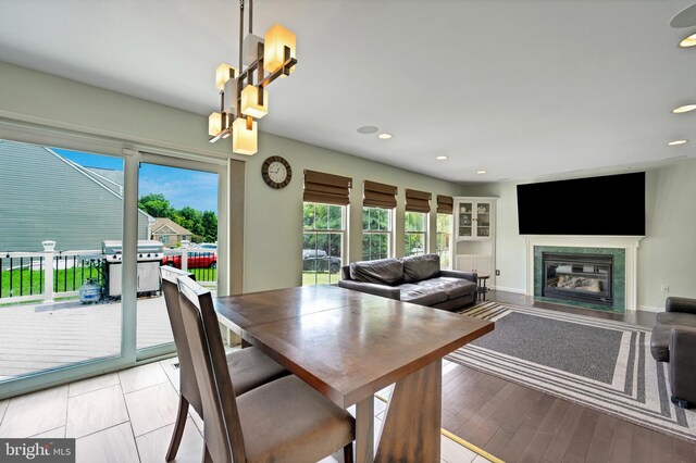 dining area featuring light wood-type flooring