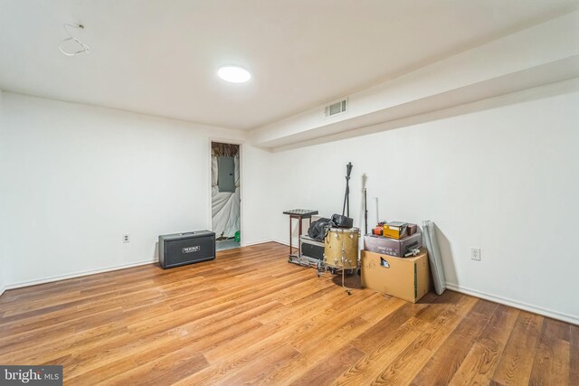 interior space with hardwood / wood-style floors