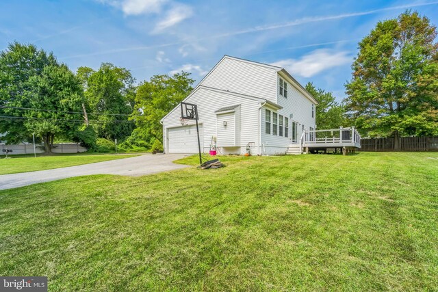 view of side of home with a lawn