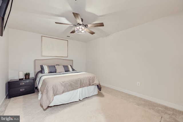 carpeted bedroom featuring baseboards, visible vents, and ceiling fan