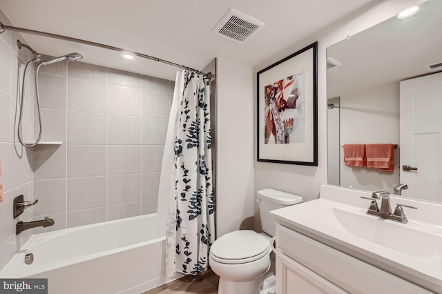 full bathroom with shower / bath combo, toilet, visible vents, recessed lighting, and vanity