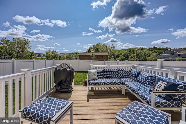 deck with a fenced backyard