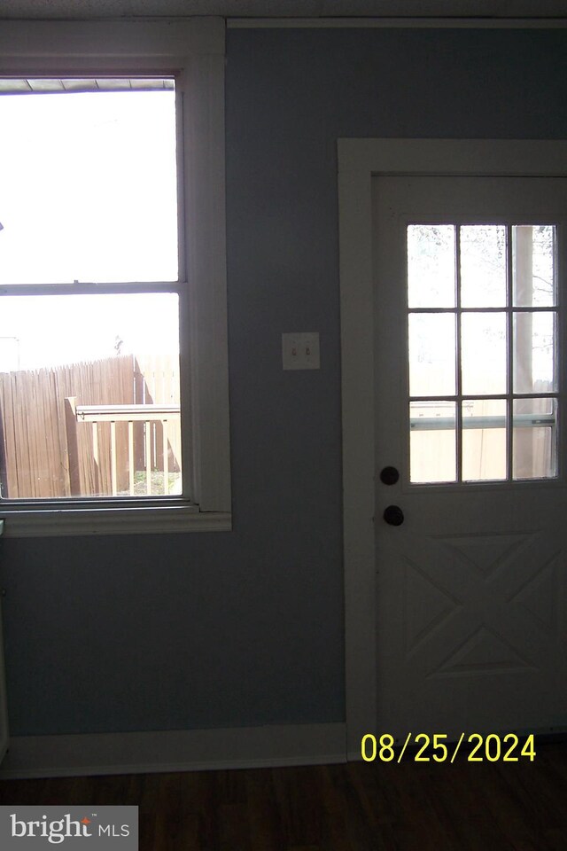 doorway featuring hardwood / wood-style flooring