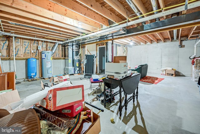 basement with electric water heater and heating unit