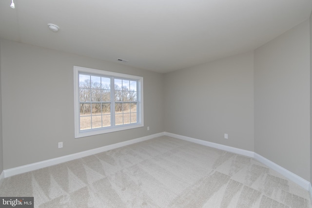 view of carpeted spare room