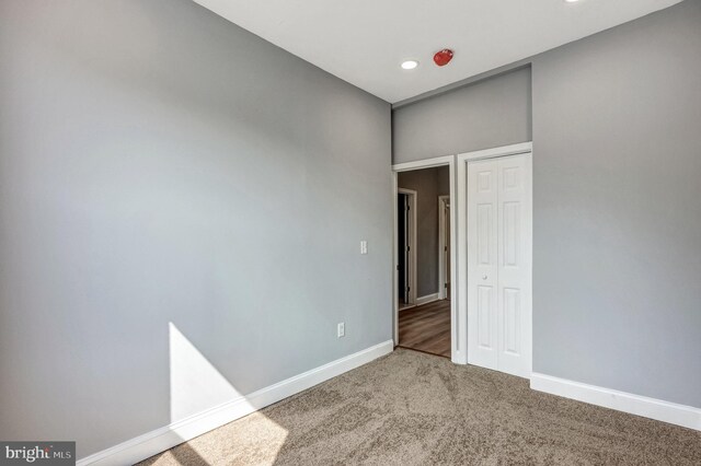 spare room featuring carpet floors