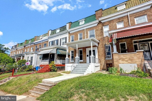 view of property with a front yard