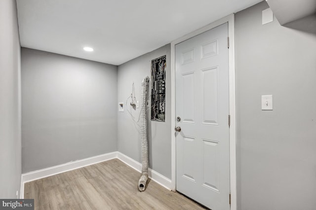 entryway with light hardwood / wood-style flooring