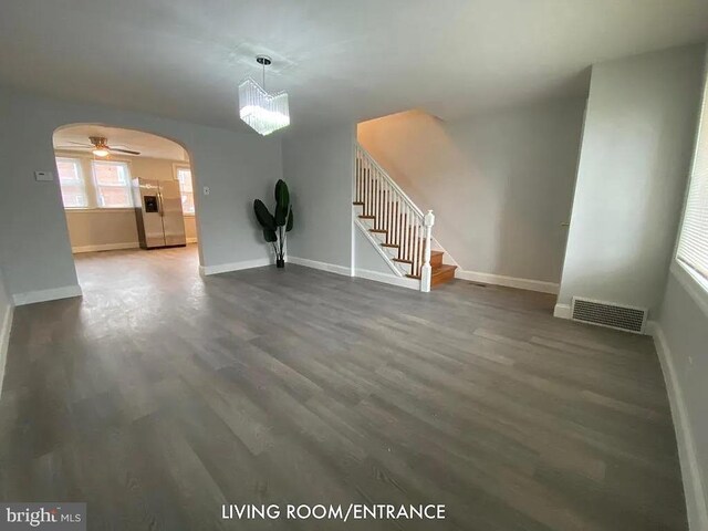 interior space with hardwood / wood-style flooring and ceiling fan