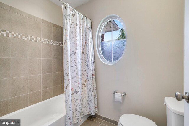 bathroom with vanity, tile patterned flooring, and toilet