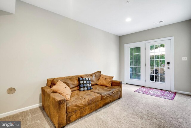 living room with light carpet