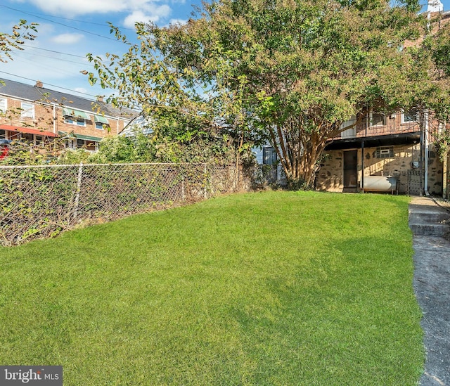 view of yard featuring fence