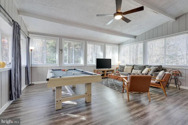 recreation room featuring a textured ceiling, vaulted ceiling with beams, billiards, ceiling fan, and hardwood / wood-style flooring